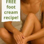 A cheerful woman applies cannabis foot cream to her feet.