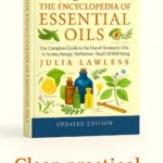 Book cover of The Encyclopaedia of Essential Oils by Julia Lawless.