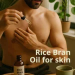 A man appyling rice bran oil to his body.
