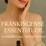 Woman holding frankincense essential oil.