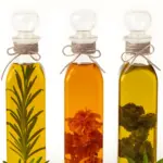3 bottles of herbal-infused Tigernut oil.