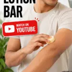 Young Indian man applying a round lotion bar to his forearm, with bold text reading Easy DIY Soft Lotion Bar and a red Watch on YouTube button.