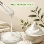 Thin white lotion flowing from a glass spatula beside a rich cream holding a soft peak, with cetearyl alcohol pellets between them. Text reads: Thin Lotion or Rich Cream? How Cetearyl Alcohol Changes Texture.